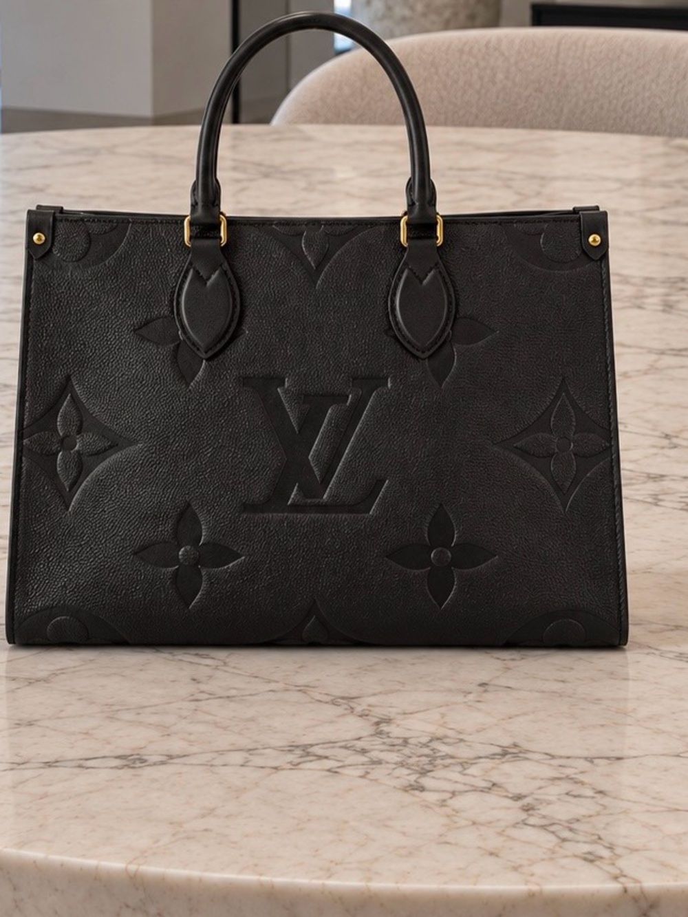 Louis Vuitton Black Embossed Monogram Tote with Gold-Tone Accents